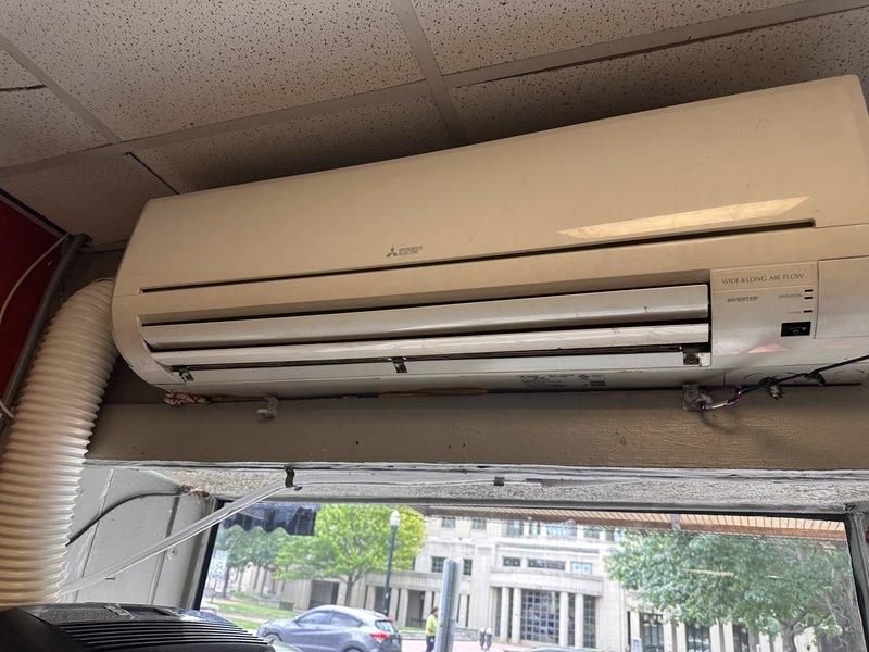 Conducted comprehensive assessment of 30-year-old Mitsubishi mini-split system requiring replacement. Evaluated existing wall-mounted indoor unit, electrical panel capacity with Square D breakers, and overall system condition to provide equipment replacement estimate for ASAP installation per customer request.