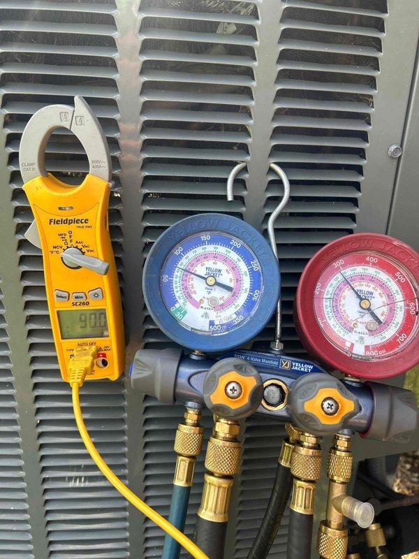 # HVAC Service Completed

Responded to service call for air conditioning system with inadequate cooling performance. Upon arrival, customer reported unit was operating but not maintaining desired temperature setpoint.

Performed comprehensive system diagnostics using calibrated test equipment. Connected manifold gauge set to measure refrigerant pressures on both high and low sides of the system. Utilized digital clamp meter to verify amperage draw on compressor circuit. 

Pressure readings and amperage measurements indicated system was operating outside normal parameters. Analysis of gauge readings on both suction and discharge sides revealed refrigerant charge discrepancy affecting cooling capacity. 

Conducted thorough inspection of condensing unit and evaporator coil accessibility points. Verified electrical connections and confirmed compressor was energizing properly based on amp draw measurements. System showed signs of reduced efficiency consistent with improper refrigerant level