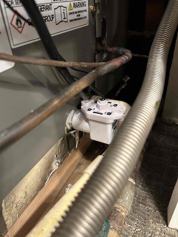 Completed residential installation of Lennox 14.3 SEER2 air conditioning system (model ML14KC1-30-230) with downflow evaporator coil (model CK40DT-30/36B) and new Honeywell S200 thermostat. Removed and properly disposed of existing equipment, obtained applicable permits, and installed new outdoor condenser unit on concrete pad with proper refrigerant line connections and electrical service including weatherproof disconnect box. Installed indoor coil assembly with condensate pump and connected copper refrigerant lines to air handler. Repaired and replaced ductwork in crawlspace to ensure proper airflow distribution throughout home. Reconnected existing furnace and adjusted blower speed settings to optimize air delivery to living areas. System tested and verified operational with proper refrigerant charge, airflow, and temperature differential. Enrolled customer in maintenance care plan including semi-annual inspections and extended warranty coverage on repairs.