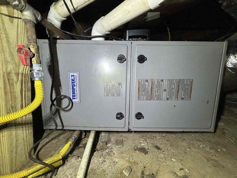 Completed residential installation of Lennox 14.3 SEER2 3-ton air conditioning system consisting of ML14KC1-036 condensing unit and CK40HT-36B-71 evaporator coil. Removed and disposed of existing equipment, then installed new system in crawl space with proper electrical connections and refrigerant lines. Repaired and modified existing ductwork to ensure proper airflow distribution throughout the living space. Pulled all applicable permits, completed installation per manufacturer specifications and local code requirements. System tested and operational upon completion with 10-year parts warranty and 1-year labor warranty provided.