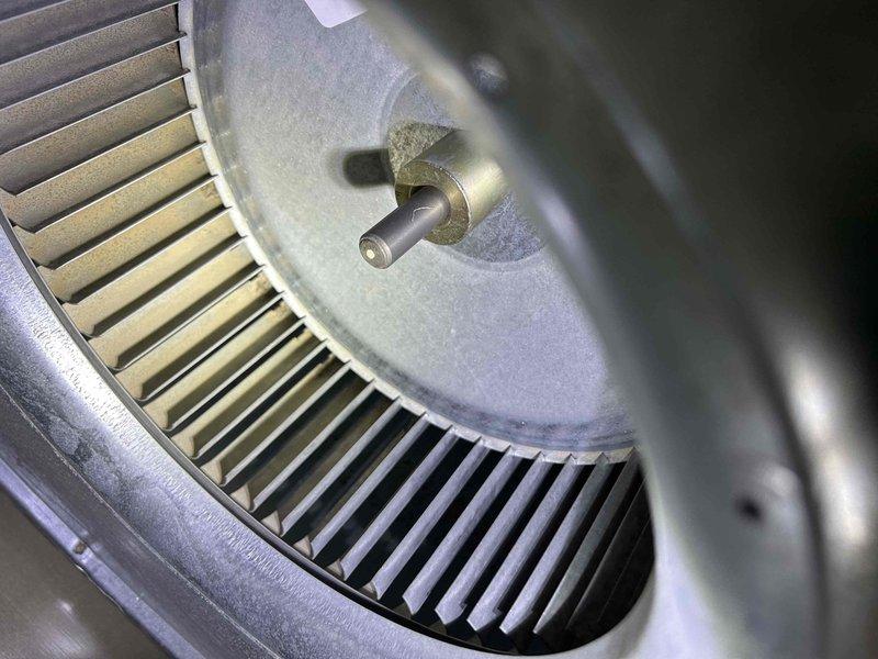Completed annual preventative maintenance on seven-year-old residential air conditioning system. Performed comprehensive tune-up including inspection of blower wheel assembly, verification of electrical parameters using clamp meter with readings within normal operating range, and capacitor testing. System operating efficiently with no deficiencies noted; all components functioning properly.
