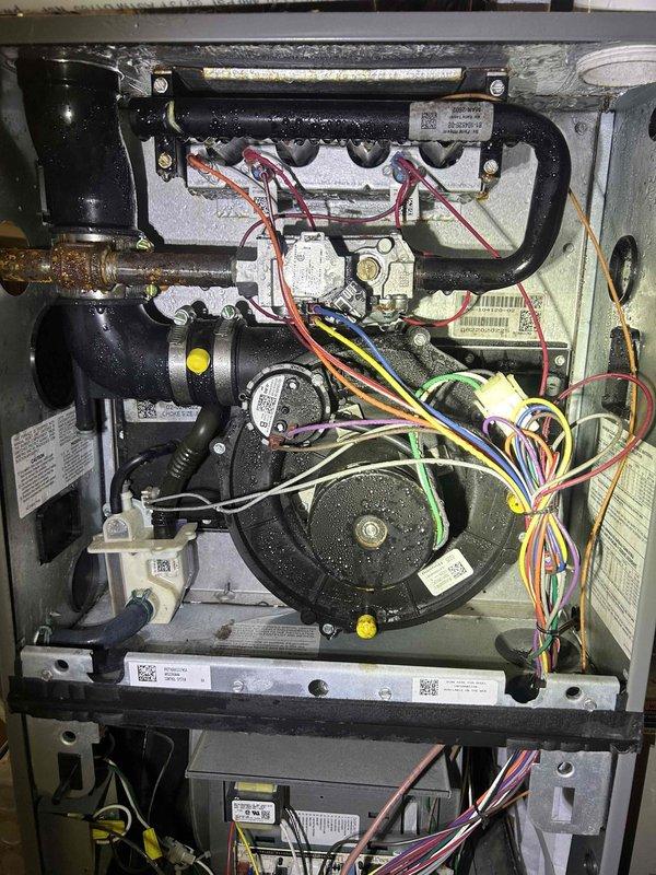 Responded to service call for AC unit experiencing reduced cooling capacity and potential dehumidification issues, particularly noticeable during nighttime operation when thermostat set to lowest temperature. Performed comprehensive diagnostic assessment of 2022-installed system, including internal component inspection with access panel removal to examine blower assembly, refrigerant lines, electrical connections, and control boards. Utilized digital measuring instruments to assess system performance parameters and airflow characteristics at the air handler unit. Documented interior component conditions including wiring harnesses, motor assembly, insulation integrity, and heat exchanger surfaces. All findings photographed for service records to support diagnostic conclusions and recommend appropriate corrective measures for restoring optimal cooling and dehumidification performance.