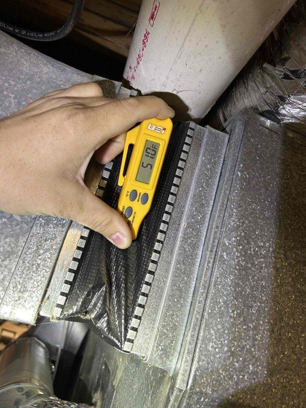 Responded to service call for AC unit experiencing reduced cooling capacity and potential dehumidification issues, particularly noticeable during nighttime operation when thermostat set to lowest temperature. Performed comprehensive diagnostic assessment of 2022-installed system, including internal component inspection with access panel removal to examine blower assembly, refrigerant lines, electrical connections, and control boards. Utilized digital measuring instruments to assess system performance parameters and airflow characteristics at the air handler unit. Documented interior component conditions including wiring harnesses, motor assembly, insulation integrity, and heat exchanger surfaces. All findings photographed for service records to support diagnostic conclusions and recommend appropriate corrective measures for restoring optimal cooling and dehumidification performance.