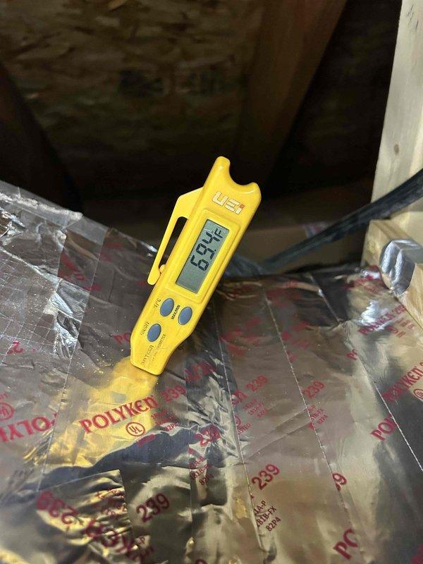 Responded to no-cool call on 5-year-old heat pump system serving upstairs zone. Upon arrival, found thermostat display active and calling for cooling, but air handler completely unresponsive with no power to unit. Accessed attic-mounted indoor unit and performed electrical diagnostics. Measured supply voltage at disconnect and traced power supply to air handler control board. Identified failed low-voltage transformer preventing system operation. Replaced defective transformer, restored power to control circuit, and verified proper 24VAC output. Cycled system through cooling mode, confirmed blower motor operation and proper airflow at registers. System restored to full operational status with normal cooling capacity.