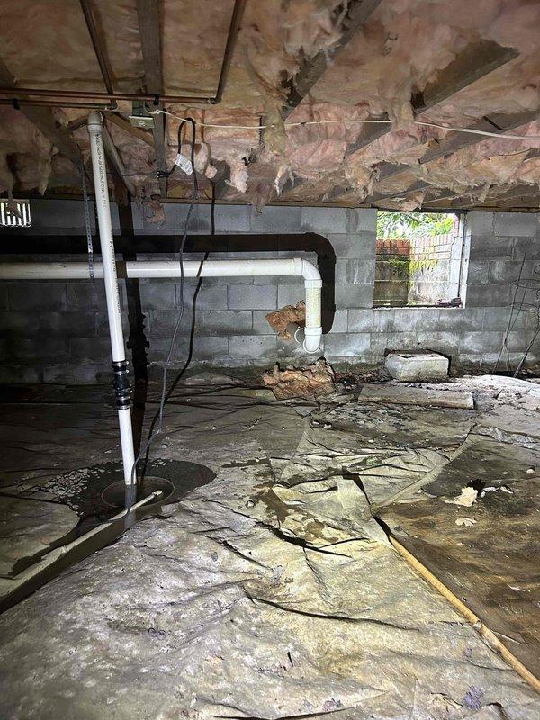 Responded to service call for four non-functioning garage outlets. Conducted electrical diagnostics to identify circuit fault affecting all four receptacles, which remained inoperative despite customer's previous replacement attempts. Traced wiring through crawl space to locate source of power loss, installed four new outlets, restored proper electrical function to all garage receptacles, and verified circuit operation and grounding integrity.