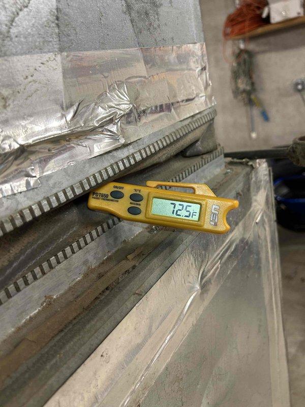 Responded to no cooling complaint on geothermal heat pump system located in basement. Customer reported unit blowing coolish air with indoor temperatures climbing, requiring frequent manual resets to maintain operation. Performed diagnostic testing and temperature measurements at supply ductwork, recording 72.5°F supply air temperature. Reviewed system controls and CXM control board specifications including field selectable inputs, test mode functions, and retry mode parameters. Identified intermittent operation issue causing inadequate cooling performance and system lockouts.