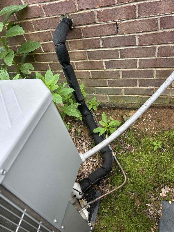 Responded to no-cool call for downstairs air conditioning system that had been inoperative for one week. Upon arrival, found Honeywell Home ProSeries thermostat calling for cooling with system showing "Cool On" mode, display reading 76°F actual temperature with 68°F setpoint. Inspected outdoor condensing unit installed approximately 2.5 years prior and verified electrical disconnect, refrigerant line set, and condensate drain installation. Diagnosed system malfunction and restored cooling operation to downstairs zone.