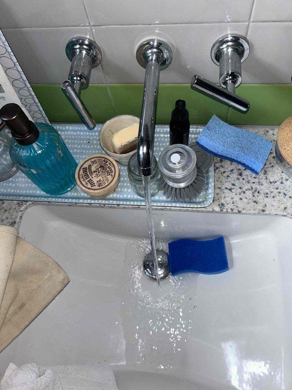 Completed tanked water heater flush service to remove sediment buildup and restore optimal heating efficiency. Performed comprehensive 65-point plumbing inspection of residential fixtures, including toilet operation, flush mechanism functionality, and sink faucet system with wall-mounted chrome fixtures. All inspected components found to be operating within normal parameters with proper water flow and drainage confirmed throughout the system.