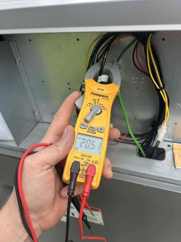 Responded to emergency no-heat call on 7-month-old system installation. Upon arrival, discovered loose wire connection at control board causing system failure. Reconnected and secured wiring, verified proper voltage readings at 20.5V, and confirmed system restored to normal operation.