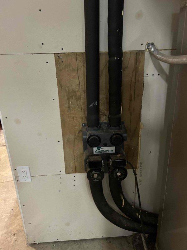 Conducted follow-up inspection of geothermal loop system to verify pressure stability after water was added during previous monthly maintenance visit. Inspected HeatMaster circulation equipment and monitored system pressure using installed gauge, which maintained stable readings with no indication of pressure loss or active leaks in the hydronic loop.