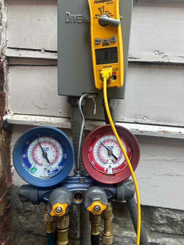 # HVAC Service Report - No Cooling Issue

Responded to service call for air conditioning system experiencing limited cooling capacity. Upon arrival, performed comprehensive diagnostic evaluation of the approximately 2-year-old AC system.

Conducted electrical testing using digital multimeter to verify proper voltage and amperage at the outdoor unit disconnect. Connected refrigerant manifold gauge set to service ports to measure system pressures on both high and low sides. Evaluated refrigerant charge levels and system operating pressures against manufacturer specifications.

Testing equipment was properly installed at the outdoor condensing unit location to monitor real-time system performance. Digital diagnostics confirmed electrical parameters while pressure gauges provided critical data on refrigerant circuit operation. Visual inspection of exterior components and electrical connections was performed as part of standard troubleshooting protocol.

Documented system conditions through