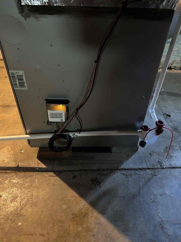 Completed full residential HVAC system installation including Bryant 2.5 ton 14.3 SEER2 air conditioning unit (model GA5SAN53000W) and matching Bryant 2.5 ton evaporator coil (model CVAVA3017XMA). Installed new refrigerant line set with proper insulation and filter drier, positioned outdoor unit on concrete pad with electrical disconnect box and whip kit. Ran and terminated new dedicated 30 AMP 230V electrical circuit to power outdoor condensing unit. Transitioned evaporator coil to existing ductwork in crawl space, installed SS2 coil drain safety water sensor for secondary drain pan protection. Connected system to existing thermostat, pulled vacuum on refrigerant lines, charged system to manufacturer specifications, and performed full operational testing to verify proper cooling performance and electrical draw. Removed and disposed of all existing equipment, obtained applicable permits, and ensured all work met code compliance standards.