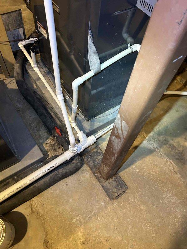 Responded to no cooling complaint on 8-year-old geothermal system located in basement. Upon arrival, customer reported unit would cool briefly upon startup then cease cooling operation, issue ongoing for approximately one week. Performed diagnostic evaluation of geothermal heat pump system including ground loop pumps, air handler, and associated controls. Inspected Geo-Flo circulation pumps for proper operation, verified electrical connections at ground loop panel, and assessed refrigerant circuit performance. Checked air handler for proper airflow, examined condensate drainage system, and tested thermostat operation and system cycling. Identified intermittent cooling issue and provided recommendations for necessary repairs to restore consistent cooling operation.