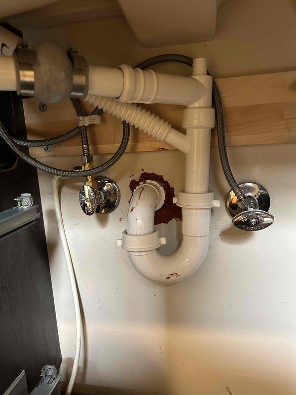 Responded to upstairs master bathroom plumbing issue where the right side vanity faucet exhibited low water pressure and leaking from the handle. Disassembled the faucet assembly and diagnosed a failed cartridge in a discontinued Delta faucet model with replacement parts only available direct from manufacturer. After consultation, full faucet replacement was authorized. New faucet unit ordered for installation at subsequent appointment. Inspection of supply connections revealed deteriorated hot water shut-off valve requiring replacement during faucet installation to ensure proper system function and prevent future leaks.