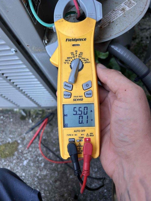 Completed prepaid Gold Level maintenance on dual HVAC system with both units located in attic accessed via pull-down steps. Performed comprehensive tune-up on two air conditioning systems aged 8 and 11 years. Inspected and cleaned washable filters on both units. Conducted electrical diagnostics using clamp meter, verifying amperage draw of 55.0A and voltage readings of 420V on system components. Tested capacitors, motor windings, and electrical connections to ensure proper operation. All measurements within manufacturer specifications. Both systems operating efficiently with no deficiencies noted.
