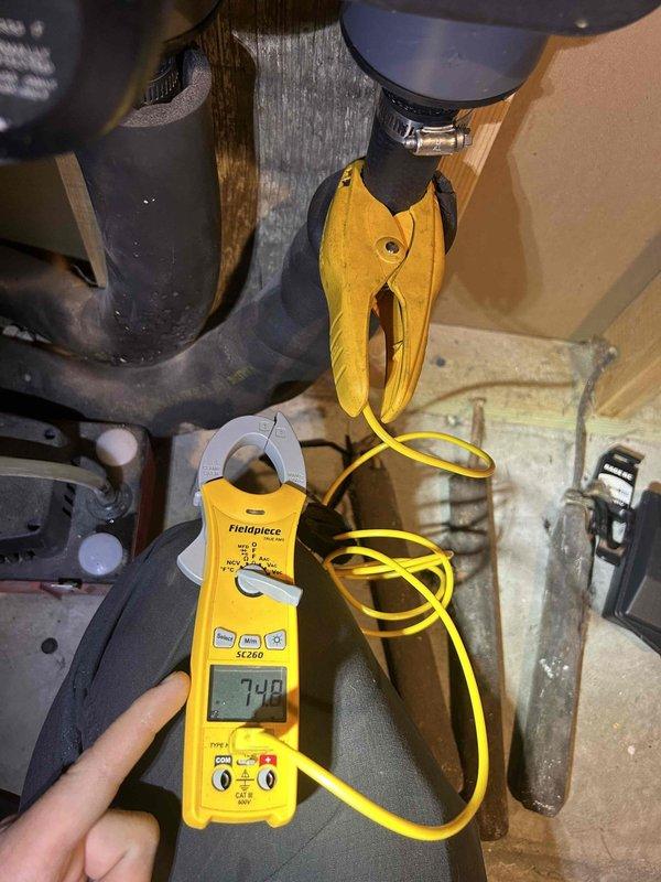 Completed comprehensive tune-up and diagnostic evaluation on 13-year-old geothermal heat pump system. Performed electrical measurements including amperage readings on system components, inspected and tested capacitor connections and control board functionality, verified proper operation of all electrical circuits and connections. All measurements within normal operating parameters; system operating efficiently with no issues found at time of service.