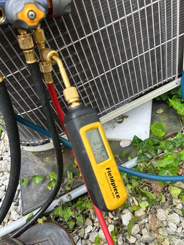 Replaced defective thermal expansion valve (TXV) on air conditioning system under parts warranty. Recovered and reused existing refrigerant from the system, installed new TXV, and added AC Renew product to enhance system performance and longevity. Connected manifold gauges and diagnostic equipment to verify proper refrigerant pressures and system operation following the repair. Total service time was approximately 4 hours to complete the warranty repair work.