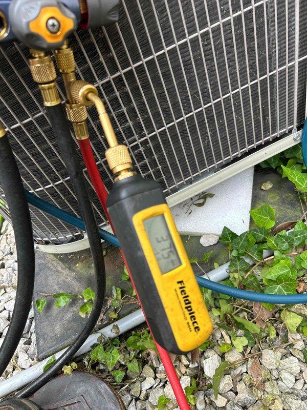 Replaced defective thermal expansion valve (TXV) on air conditioning system under parts warranty. Recovered and reused existing refrigerant from the system, installed new TXV, and added AC Renew product to enhance system performance and longevity. Connected manifold gauges and diagnostic equipment to verify proper refrigerant pressures and system operation following the repair. Total service time was approximately 4 hours to complete the warranty repair work.