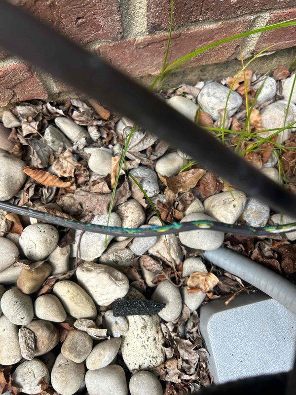 Responded to pre-purchase inspection concerns regarding outdoor HVAC unit at residential property. Performed comprehensive evaluation of refrigerant line insulation, which showed deterioration and missing sections on copper lines running from building exterior to condensing unit. Inspected electrical disconnect box, conduit routing, and overall system condition. Documented equipment age, refrigerant line integrity, and insulation deficiencies with photographic evidence for homebuyer's due diligence review.