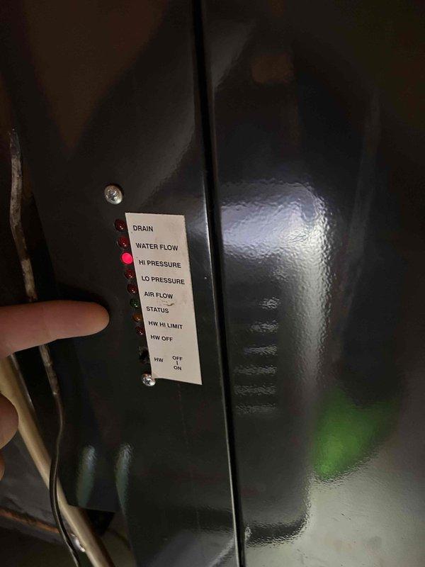 Responded to no cooling call affecting both upstairs and downstairs HVAC systems. Upon inspection, found Trane air handler in basement with multiple system faults indicated on control panel, including drain, pressure, and airflow error codes. Customer utilizing temporary portable air conditioning unit for interim cooling while systems remain non-operational.
