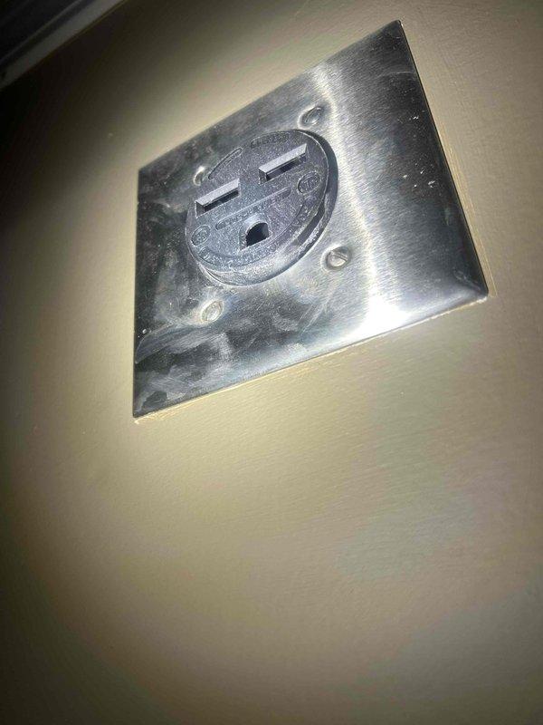 Responded to no cooling complaint on 15-year-old electric PTAC unit with indoor temperature at 80 degrees. Diagnosed failed compressor and damaged power cord requiring replacement. Provided customer with repair options and documented equipment condition with photos of electrical connections and replacement power cord.