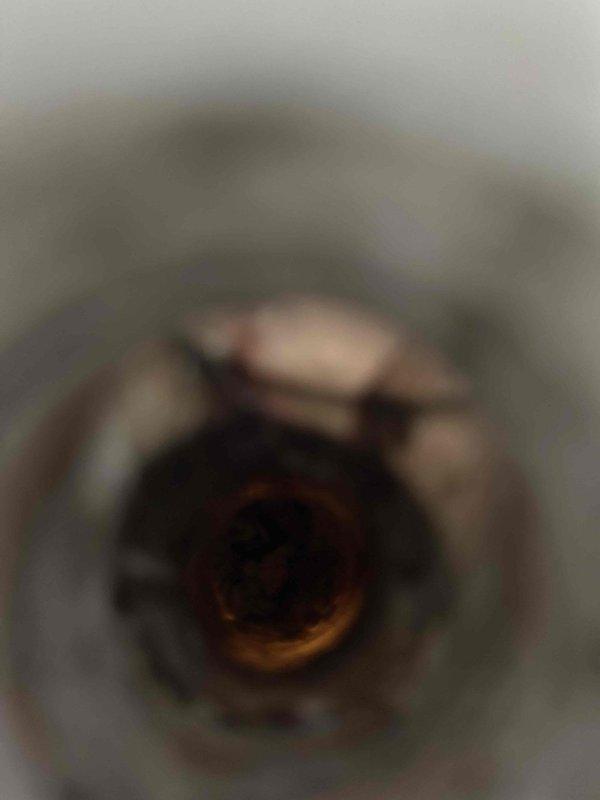 Responded to callback for system not reaching target temperatures with elevated indoor humidity levels. Found condensate drain line completely clogged, causing drainage issues and contributing to high humidity conditions. Cleared drain line obstruction and adjusted blower motor speed to tap four setting to improve dehumidification performance. Discussed long-term solutions including whole house dehumidifier installation and potential variable speed system upgrade if humidity control issues persist.