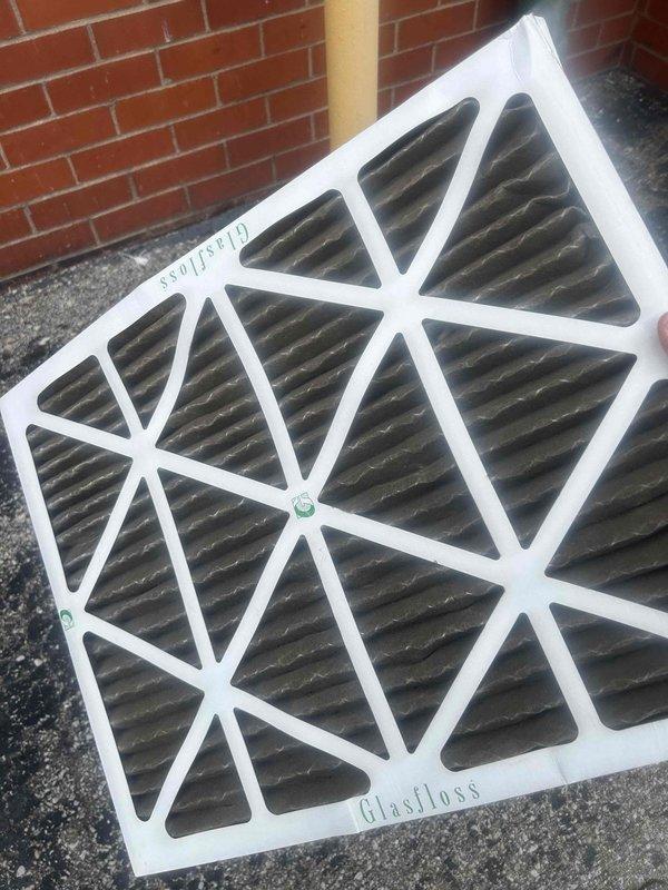 Responded to no cooling complaint on rooftop commercial HVAC unit following power outage. Upon inspection, found heavily soiled air filter restricting airflow, causing unit to short cycle on safety controls. Replaced dirty filter and verified system operation with supply air temperature reading of 75°F at startup. Unit cycled properly and began cooling normally after filter replacement, resolving the issue caused by the power interruption.