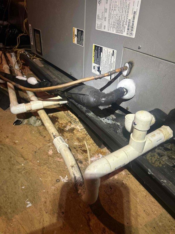 Responded to service call for HVAC system performance concerns and thermostat upgrade request. Inspected both air conditioning units on property, including 20-year-old system and secondary unit. Evaluated system operation, ductwork configuration, and air handler components in attic installation. Documented existing equipment conditions including drain line connections, refrigerant lines, condensate pan status, and overall system infrastructure. Both units confirmed operational for heating and cooling functions at time of inspection. Installed new Google Nest thermostat to replace existing unit, ensuring proper wiring connections and system compatibility. Provided customer with system assessment and thermostat programming guidance.