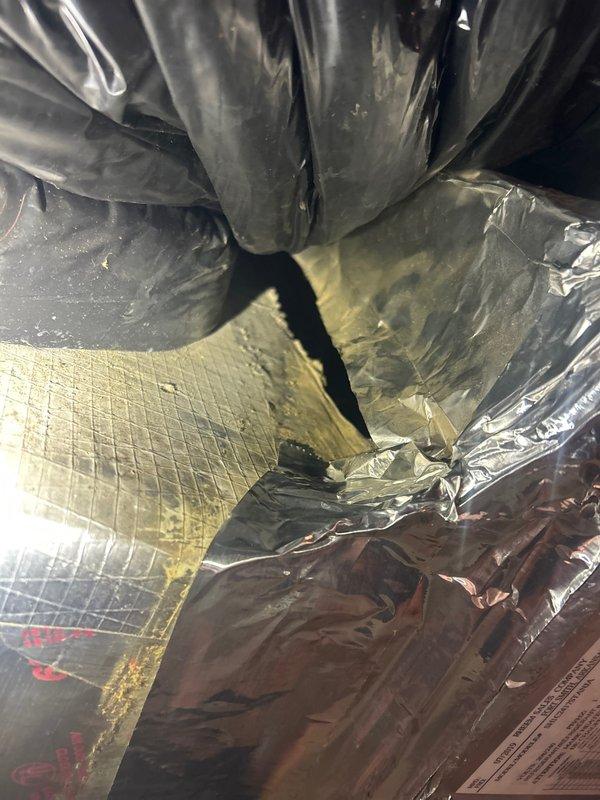 Responded to service call for HVAC system performance concerns and thermostat upgrade request. Inspected both air conditioning units on property, including 20-year-old system and secondary unit. Evaluated system operation, ductwork configuration, and air handler components in attic installation. Documented existing equipment conditions including drain line connections, refrigerant lines, condensate pan status, and overall system infrastructure. Both units confirmed operational for heating and cooling functions at time of inspection. Installed new Google Nest thermostat to replace existing unit, ensuring proper wiring connections and system compatibility. Provided customer with system assessment and thermostat programming guidance.