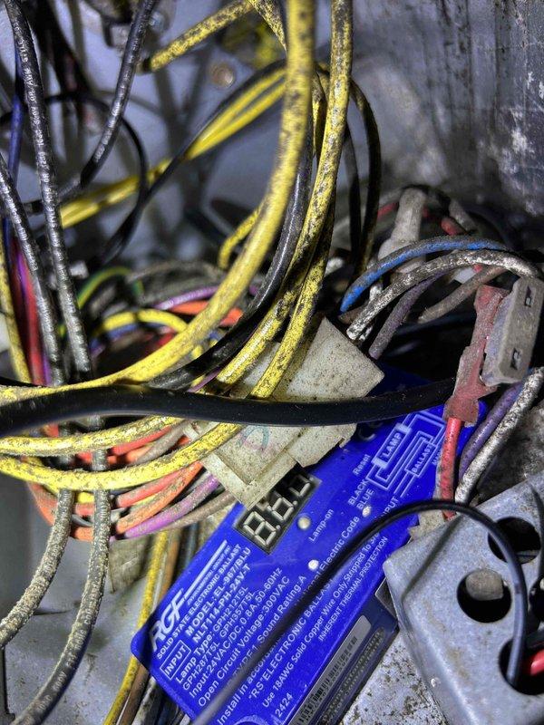 Responded to no cooling complaint on gas furnace system. Upon inspection, found electrical wiring connections at air handler with heavy dust accumulation and potential loose connections affecting system operation. Evaluated control board and tested electrical components using diagnostic equipment to identify communication failure between thermostat and cooling system. Cleaned connections, verified proper voltage at terminals, and restored system to normal cooling operation. System tested and confirmed operational before departure.