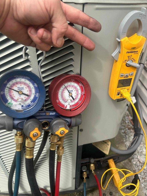 Responded to service call for second opinion regarding water accumulation at base of furnace unit. Performed comprehensive diagnostic evaluation of existing HVAC system to determine whether repair or replacement was most appropriate course of action. Utilized manifold gauge set to measure refrigerant pressures and system performance, checking both high and low side readings. Employed digital clamp meter to assess electrical amperage draw and verify proper component operation. Inspected insulation and ductwork for potential moisture intrusion points. Evaluated overall system condition, efficiency ratings, and remaining service life of equipment. Provided detailed estimate for complete system replacement as GREEN tier option, outlining equipment specifications and installation scope.