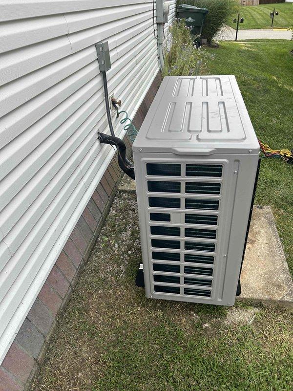 Completed full residential HVAC system installation featuring Friedrich Breeze equipment. Installed air handler unit in attic space with proper mounting between structural framing, connected refrigerant lines, electrical wiring, and integrated flexible ductwork. Positioned outdoor condenser unit on concrete pad with secure wall-mounted line set support and established all necessary connections. Warranty registration for all equipment to be submitted.