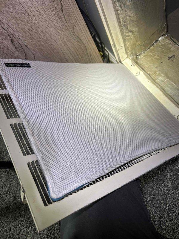 Responded to no cooling complaint on less than one-year-old electric HVAC system running excessively during heat wave. Performed system diagnostics and inspected indoor unit located in kitchen closet. Evaluated air filter condition, which had been changed recently, and verified proper airflow through return air grille and ductwork. System components inspected and found to be operating within normal parameters for extreme ambient conditions.