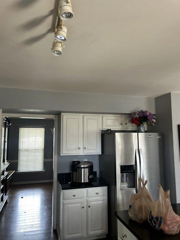 Installed new gas piping from existing gas supply line to kitchen range location to facilitate conversion from electric to gas cooking appliance. Routed black iron pipe through garage space and terminated with appropriate shut-off valve and appliance connector at stove location per code requirements.