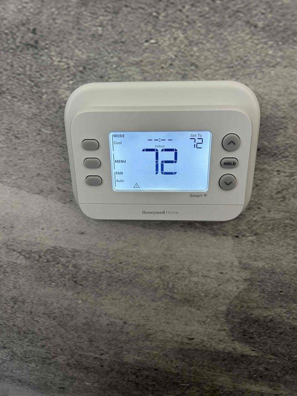 Provided estimate for replacement of three existing thermostats located in attic, bedroom, and downstairs living area. Customer expressed concerns regarding current Nest thermostat's auto-adjustment functionality not operating as desired. Documented existing equipment including smart thermostat models currently installed and discussed upgrade options to address performance issues.