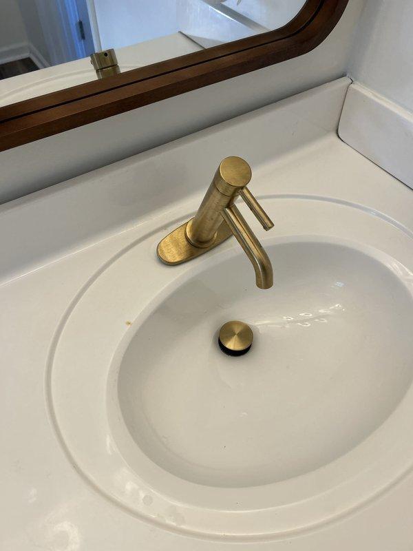 Responded to service call to reconnect kitchen plumbing fixtures including garbage disposal, sink drain assembly, and dishwasher. Successfully reinstalled and secured all plumbing connections under sink, ensuring proper P-trap installation and verifying all drain lines were leak-free and functioning correctly.