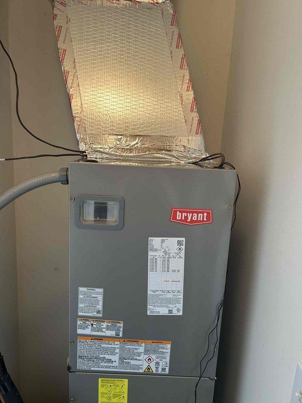 Installed a complete Bryant 2-ton 14.3 SEER2 single-stage heat pump system including outdoor unit model GH5SAN024, indoor air handler model FJ5ANX24, and 10KW auxiliary heat kit. Mounted air handler on interior wall, connected reflective insulated ductwork, completed all electrical wiring and circuit breaker installation, and installed digital thermostat for system control.
