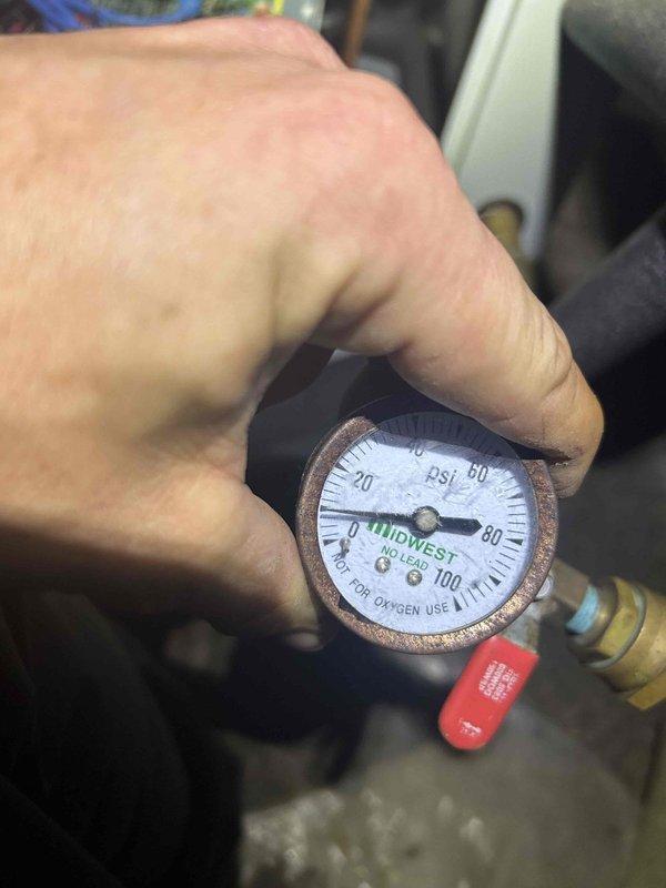 Completed scheduled care plan maintenance visit on crawlspace-located HVAC system. Performed filter change using customer-supplied filter retrieved from porch, conducted electrical measurements with clamp meter showing proper amperage readings, and verified system pressures within normal operating range using calibrated gauge. Ensured crawlspace access light was turned off and door properly secured upon completion per customer requirements.