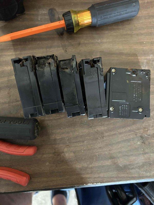 Responded to service call for electrical panel breaker replacement. Upon inspection, identified severely corroded and damaged circuit breakers showing signs of overheating, melting, and deterioration. Removed four compromised breakers from the main electrical panel and replaced with new Siemens breakers to restore safe operation. Verified proper connections, tested all circuits for correct operation, and confirmed system functionality. Panel was properly labeled with circuit designations for all household appliances and rooms including HVAC systems, kitchen appliances, water heater, and various rooms throughout the residence.