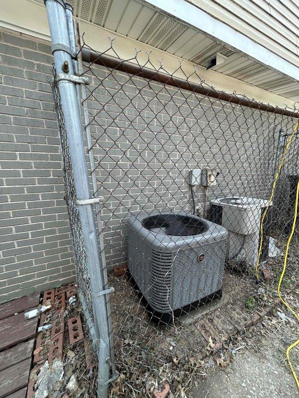 Completed full HVAC system installation including RUUD 2-ton heat pump (model RP14AY24AJ2NA), RUUD 2-ton air handler (model RH2TY2417STANNJ), and RUUD 5 kW heat kit (model RXBH-1724A05J-B) with digital thermostat. Installed outdoor heat pump unit on pad with snow legs, electrical whip kit, and disconnect box; applied refrigerant line insulation and installed refrigerant line filter. Mounted air handler in utility room with transition to existing ductwork, standard-sized air filter rack, and trap installation. Installed SS2 coil drain safety water sensor and "Ceiling Saver" overflow drain pan with water sensor for secondary protection. Completed all electrical connections, tested system operation, and verified proper refrigerant charge and airflow. System protected by 1-year labor warranty and 10-year parts warranty, with complimentary 1-year maintenance plan enrollment providing semi-annual inspections.