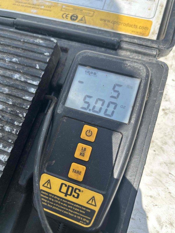 Responded to service call for newly installed HVAC system not cooling adequately, with indoor temperature reading 79°F. Upon arrival, connected refrigerant manifold gauges and verified system pressures and temperatures, which indicated low refrigerant charge. Added 5.00 lbs of refrigerant to system per manufacturer specifications using calibrated digital scale. System now operating within normal parameters and cooling properly.