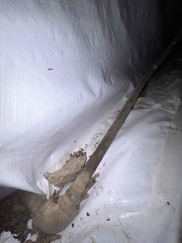 Completed comprehensive 65-point plumbing inspection in response to customer report of continuous running water. Conducted thorough examination of all accessible plumbing fixtures and components throughout the property. Inspected toilet assembly, including fill valve, flapper, flush valve, and tank components for signs of leakage or malfunction that could cause continuous water flow. Evaluated water supply lines, shut-off valves, and connections for proper operation and potential leak sources. Examined basement utility area where deteriorated concrete flooring and water staining on tiled walls indicated possible historical moisture intrusion issues. Documented all findings with photographic evidence for customer records and future reference.