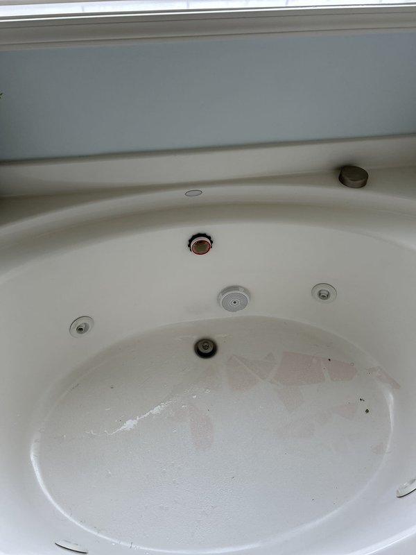 Responded to a main drain cleanout service call for a clogged jetted bathtub in the master bathroom that was experiencing backfilling issues. Successfully cleared the obstruction from the tub drain, restoring proper drainage function to the fixture.
