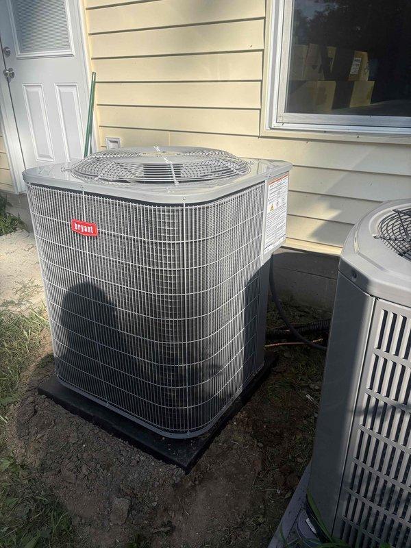 Completed full HVAC system replacement including removal and disposal of existing equipment. Installed Bryant 70K BTU 80% efficiency gas furnace (model 800SB36070M17), Bryant 2.5 ton 15 SEER2 air conditioning unit (model CVAVA3017XMA), and Bryant evaporator coil (model GA5SAN53000W) with digital thermostat. Installation included outdoor unit pad, electrical whip kit, electrical disconnect box, 10 feet of insulated refrigerant line set, refrigerant line filter drier, transition from evaporator coil to existing ductwork, and SS2 coil drain safety water sensor. Obtained applicable permits, tested system operation, and enrolled equipment in annual maintenance care plan with semi-annual inspections. System covered by 1-year labor warranty, 10-year parts warranty, and 20-year heat exchanger warranty.