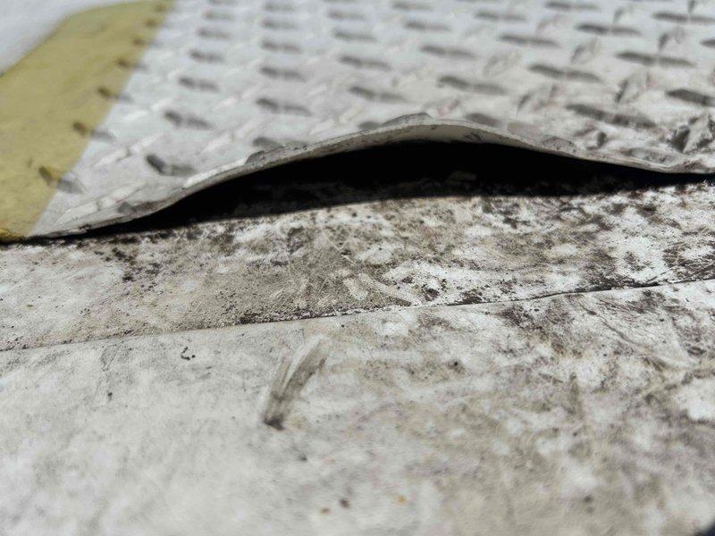 Responded to commercial water leak complaint affecting drop ceiling tiles and light fixtures. Investigated condensation issue originating from HVAC ductwork system. Inspection revealed moisture accumulation on metal ductwork with visible staining and discoloration on duct surfaces, confirming condensation as source rather than plumbing-related leak. Documented conditions of exposed ductwork above drop ceiling, including duct seams, connections, and areas where moisture had penetrated ceiling system. Assessed insulation gaps and temperature differential points contributing to condensation formation on sheet metal ductwork.
