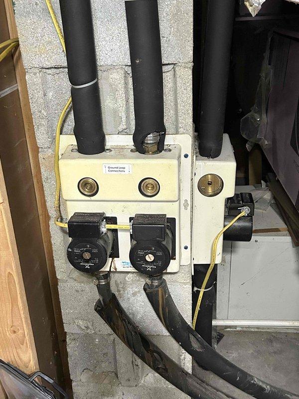 Responded to no cooling complaint on 20-year-old geothermal system following power outage. Upon arrival, found unit circulating air but delivering no cooling to conditioned space. Performed diagnostic evaluation of basement-located equipment including ground loop pumps, control panels, and air handler. Inspected control board circuitry, relay operation, and power distribution to all major components. Verified proper operation of circulation pumps and checked pressure readings on ground loop system gauges. Tested thermostat communication and control voltage at circuit board terminals. System restored to normal cooling operation after diagnostic procedures completed.