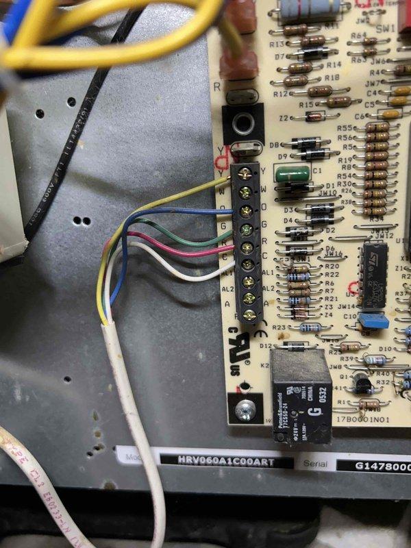 Responded to no cooling complaint on 20-year-old geothermal system following power outage. Upon arrival, found unit circulating air but delivering no cooling to conditioned space. Performed diagnostic evaluation of basement-located equipment including ground loop pumps, control panels, and air handler. Inspected control board circuitry, relay operation, and power distribution to all major components. Verified proper operation of circulation pumps and checked pressure readings on ground loop system gauges. Tested thermostat communication and control voltage at circuit board terminals. System restored to normal cooling operation after diagnostic procedures completed.