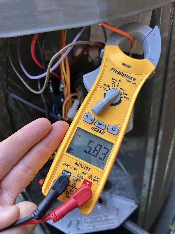 Completed comprehensive maintenance on dual HVAC system including gas furnace and air conditioning units. Performed standard tune-up procedures on both systems, inspecting blower wheel assembly which showed normal operational wear with minor dust accumulation on blades and housing. Conducted electrical diagnostics using digital multimeter, verifying amperage draw at 5.83 amps indicating proper motor operation. Inspected humidifier as requested and found it functioning within normal parameters. Replaced air filters on all systems per maintenance agreement requirements. All equipment tested and operating efficiently with no immediate service needs identified.
