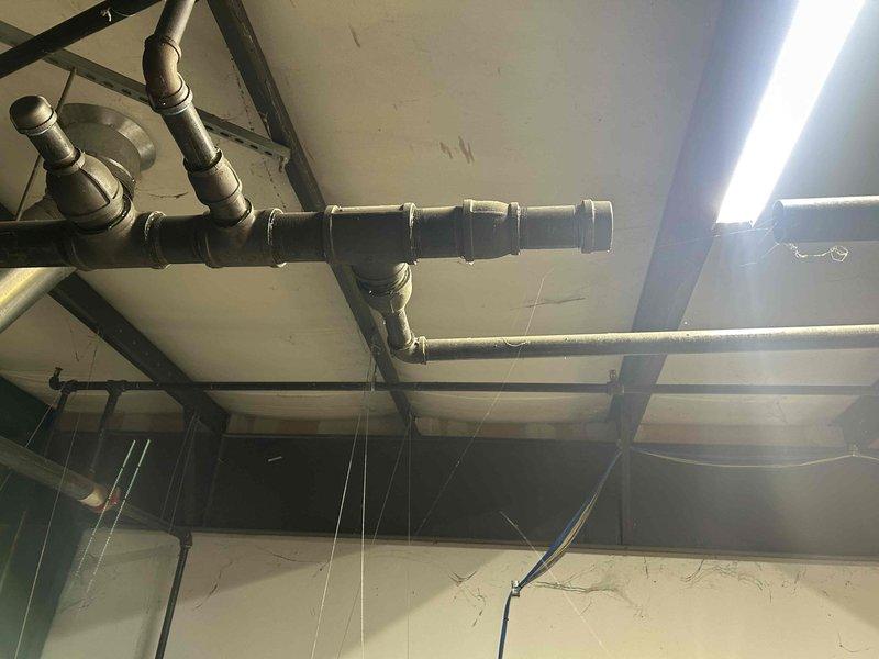 Conducted site assessment for reconnecting gas service to warehouse heating units where the supply line had been previously capped. Inspected existing gas piping infrastructure, including capped supply line terminus and overhead distribution network, documented current conditions of pipes, fittings, and connection points, and prepared estimate for restoration of gas service to operational heaters.
