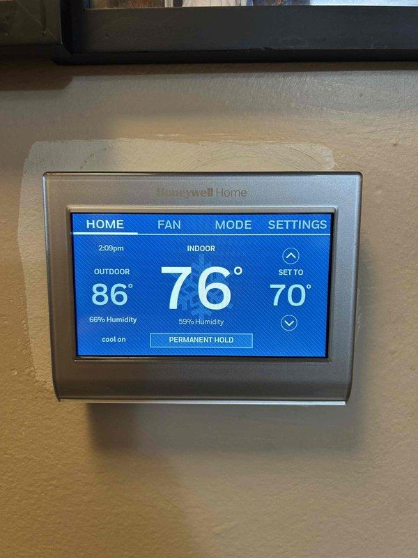 Replaced defective thermostatic expansion valve (TXV) under warranty on heat pump system and performed complete lineset flush to remove contaminants. Successfully installed customer-supplied Honeywell Home smart thermostat with programming and system verification completed.